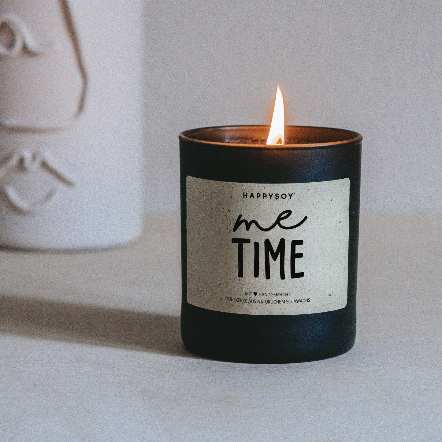 Duftkerze 'me time' schwarz