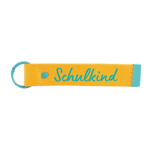 Taschenanhänger mit Schriftzug 'Schulkind' gelb/türkis