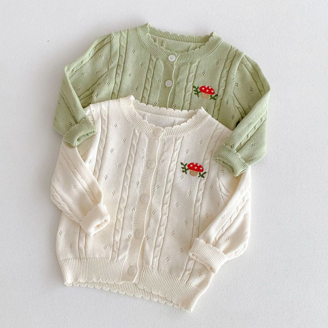 Baby Strickjacke mit Piltstickerei beige