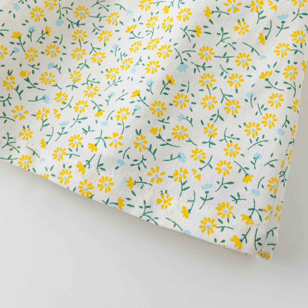 Mädchenkleid mit Blumenmuster gelb