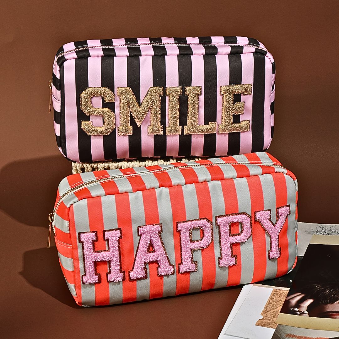 Kosmetiktasche gestreift mit HAPPY Aufdruck