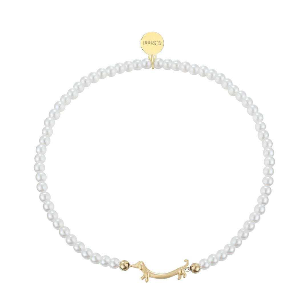 Damen Armband mit Perlen und Dackelanhänger gold