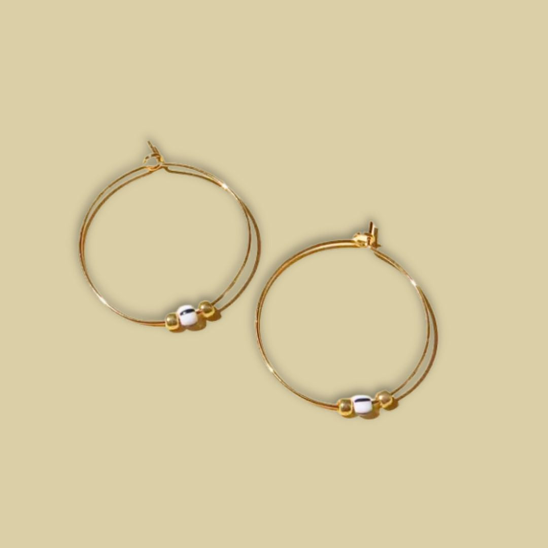 Damen Creolen Hoops schwarz gestreifte Rocailles Perle