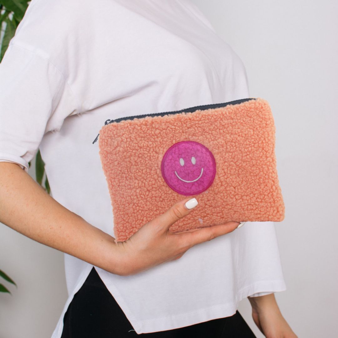 Damen Kosmetiktasche mit Teddyfell und Smiley orange