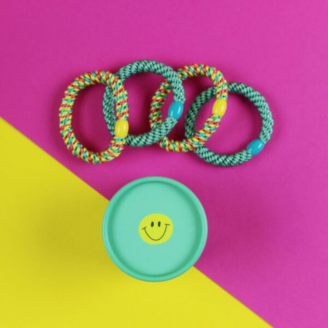 Haargummi-Set mint/gelb mit 4 Haargummis in runder Geschenkbox