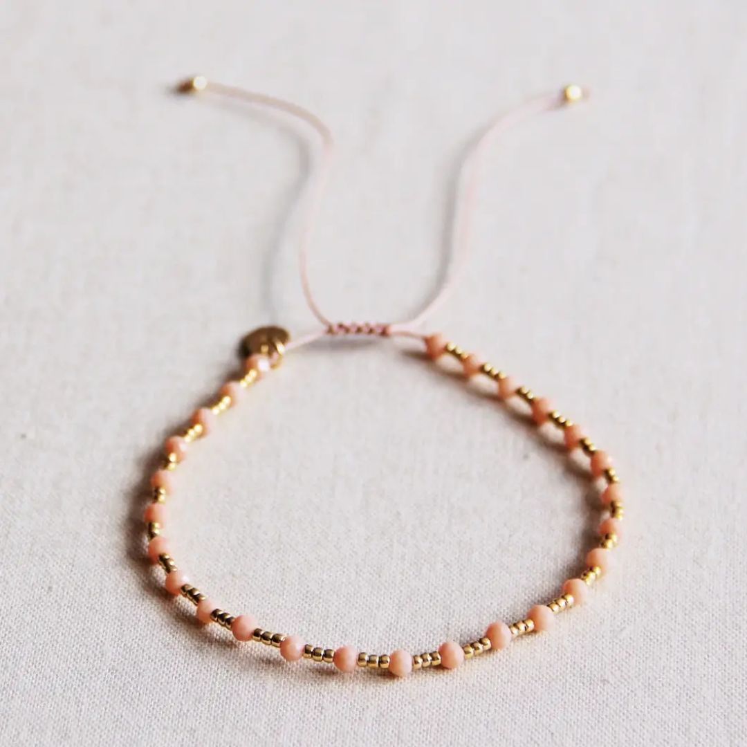Miyuki-Armband mit kleinen Edelsteinen gold/pfirsich