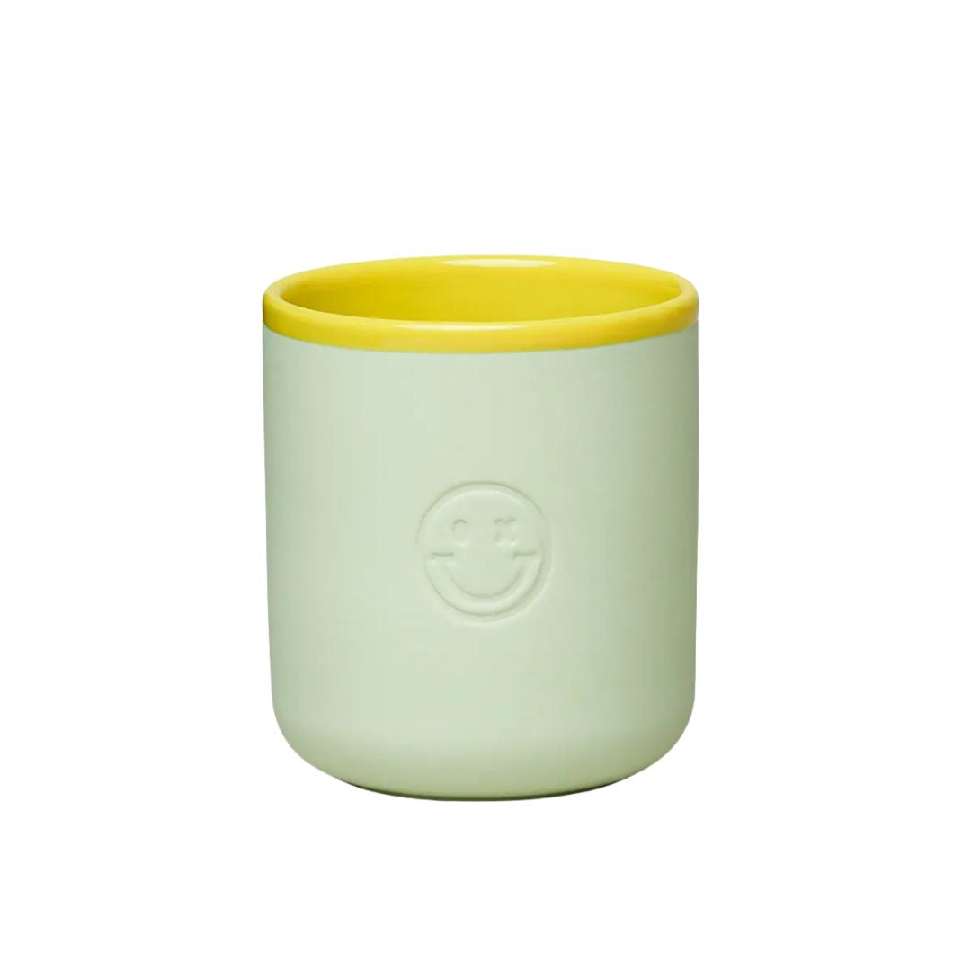 Good Mood Porzellanbecher mit Smiley 'Cheeky' mint/gelb