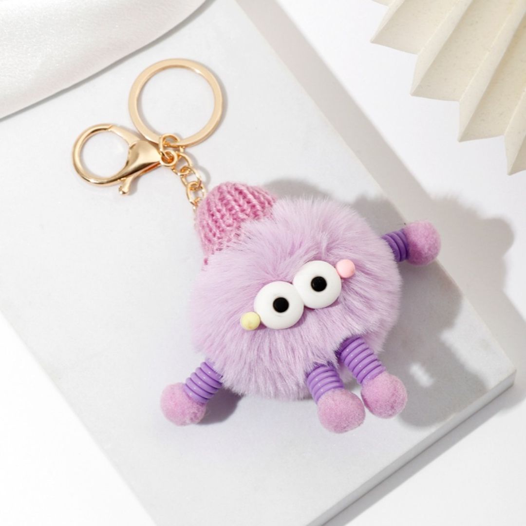 Süßer Plüsch Schlüsselanhänger 'Lil Pompon' lila