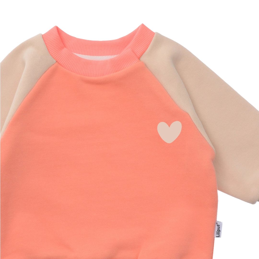 Sweatshirt in orange/beige mit Print 'Herz'