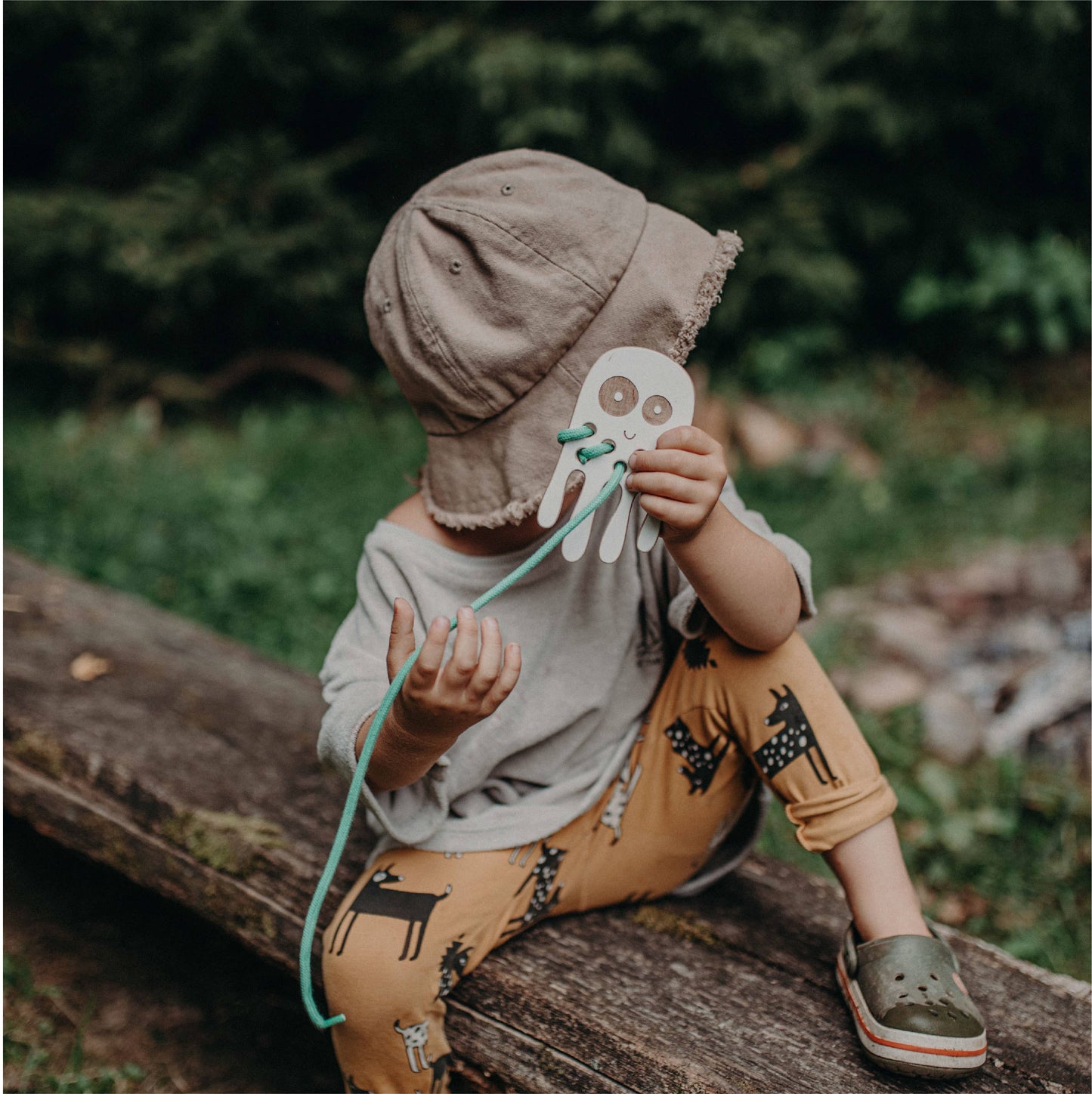 Kleines Schnürspielzeug aus Holz 'Der Oktopus'