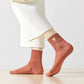 Lange goldene Herzsocken coral