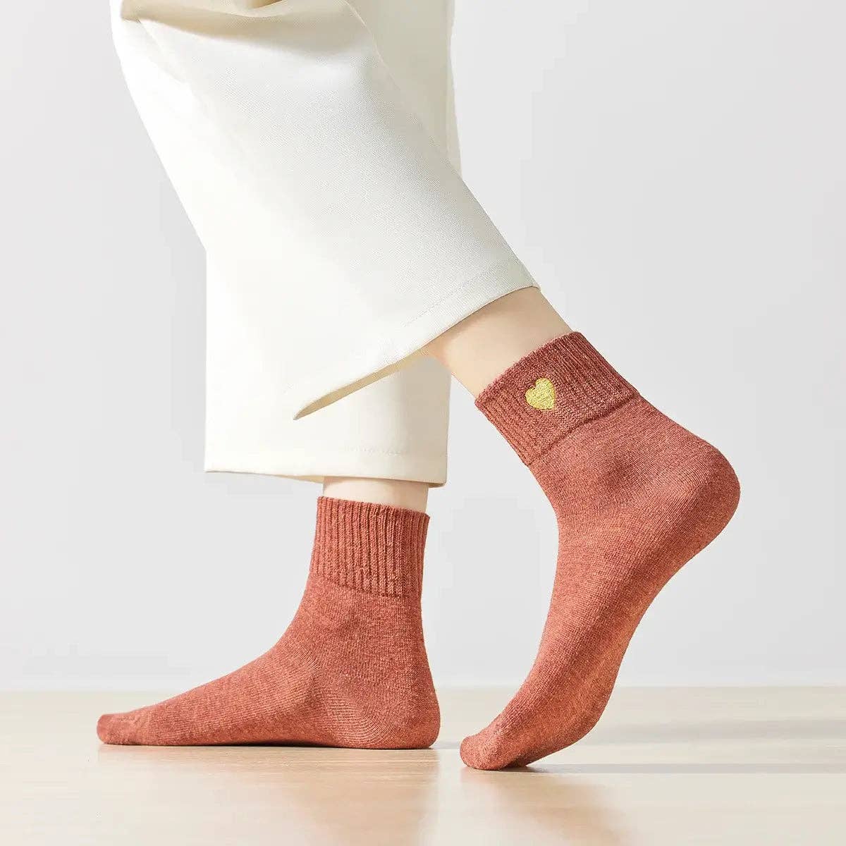 Lange goldene Herzsocken coral