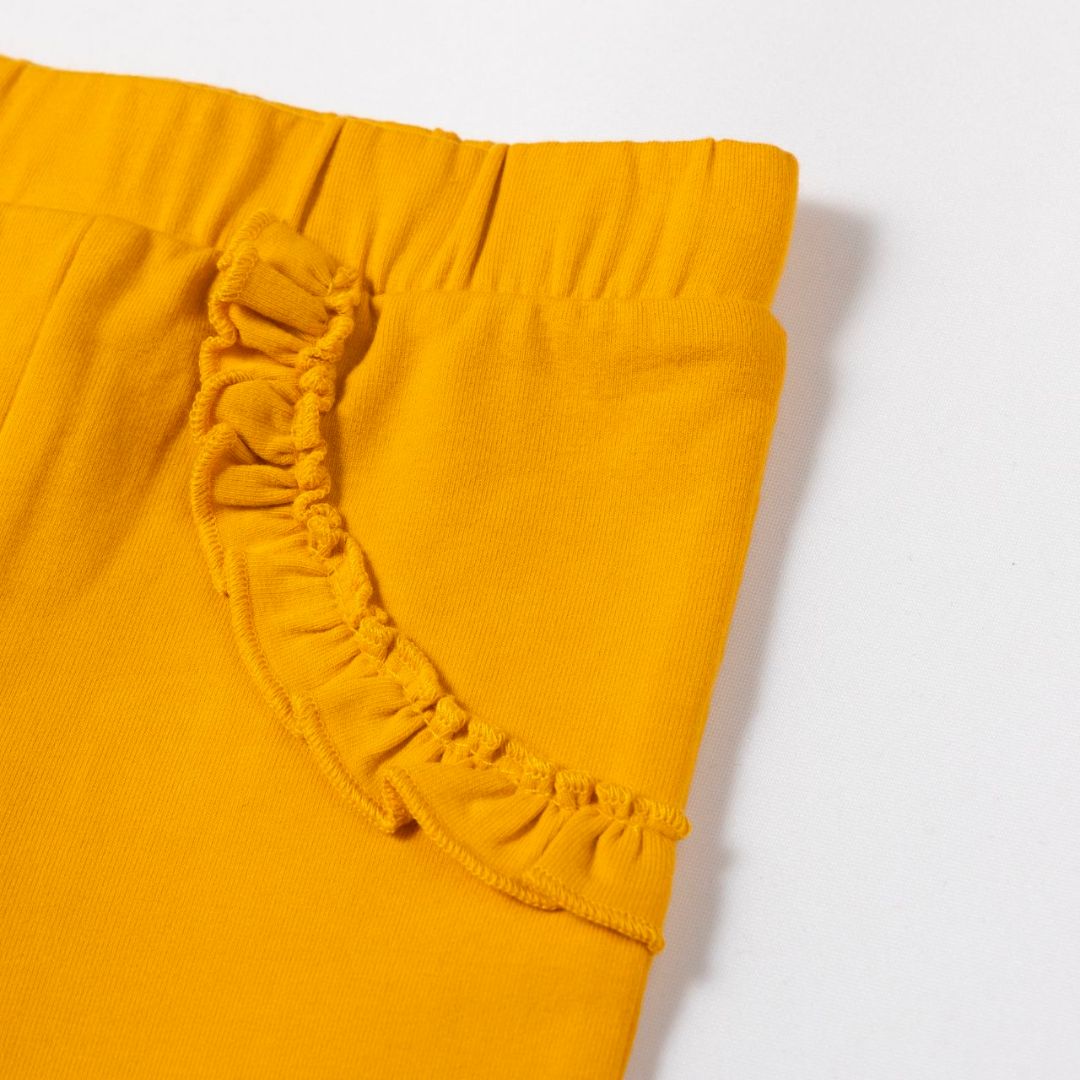 Hose für Mädchen mit Rüschen senfgelb