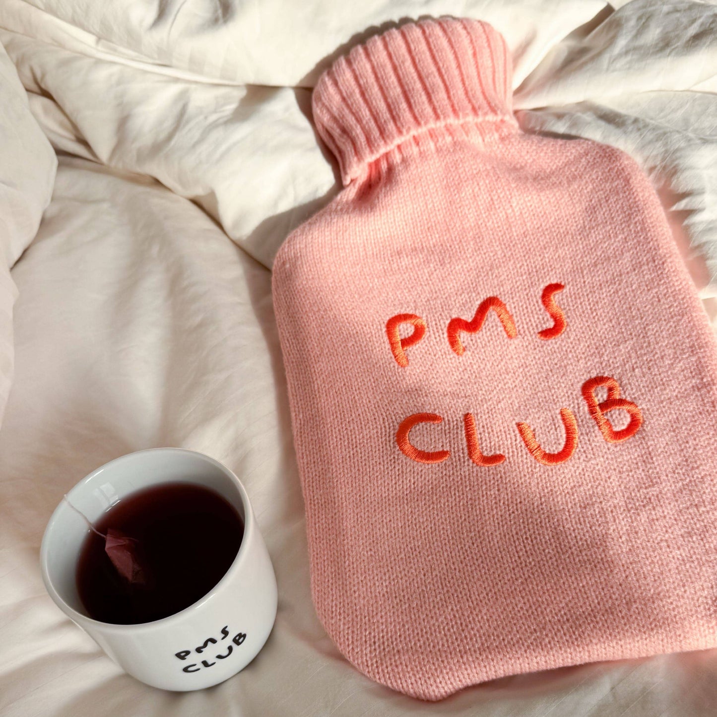 Wärmflasche 'PMS Club' rosa