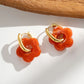 Damen Creolen gold mit bunten Harzblumen rot