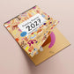 Familienkalender 2027 'Bunte Bande' inkl. Poster + 88 Sticker