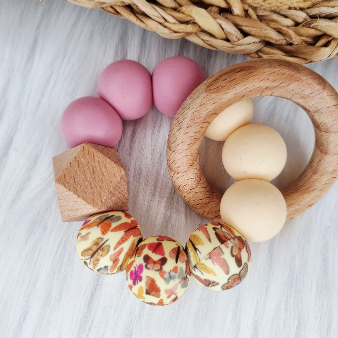 Happy Beißring 'Schmetterling' dusty rose/vanille