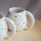 Keramiktasse handbemalt 'Bunte Herzen'