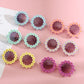 Kinder Sonnenbrille 'Flowers' rund verschied. Farben