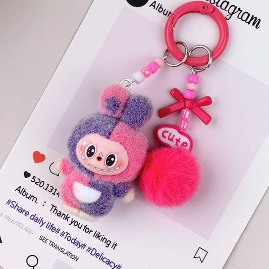 Labubu inspirierter Schlüsselanhänger 'Colorblock' rot/lila