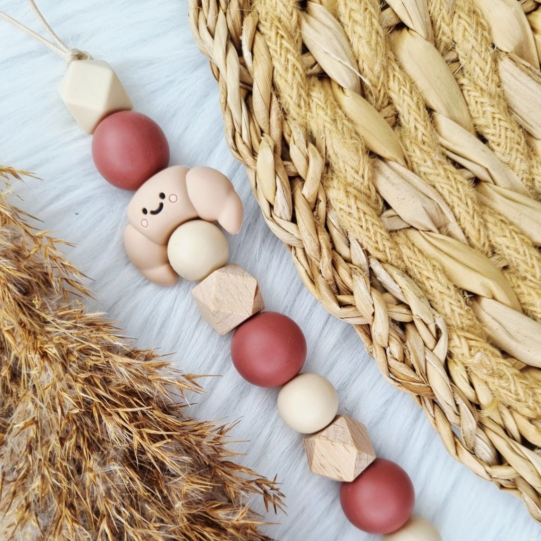 Schnullerkette Croissant blush