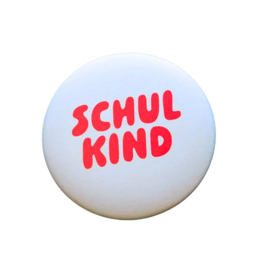 Ansteckbutton 'SCHULKIND' weiß/rot