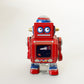 Aufziehspielzeug Roboter klein rot