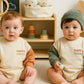 Baby Langarm Body 'Happy' apricot