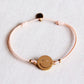Elastisches Armband mit Smiley pfirsich/gold
