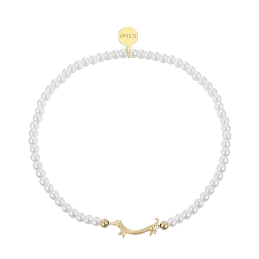 Damen Armband mit Perlen und Dackelanhänger gold