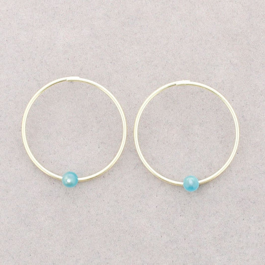 Damen Creolen mit blauer Perle