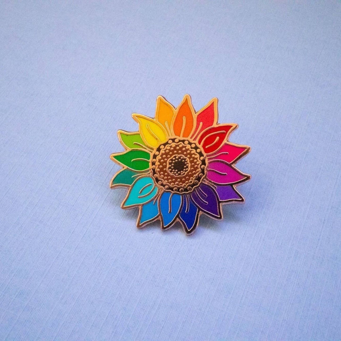 Anstecknadel mit Sonnenblume in Regenbogenfarben