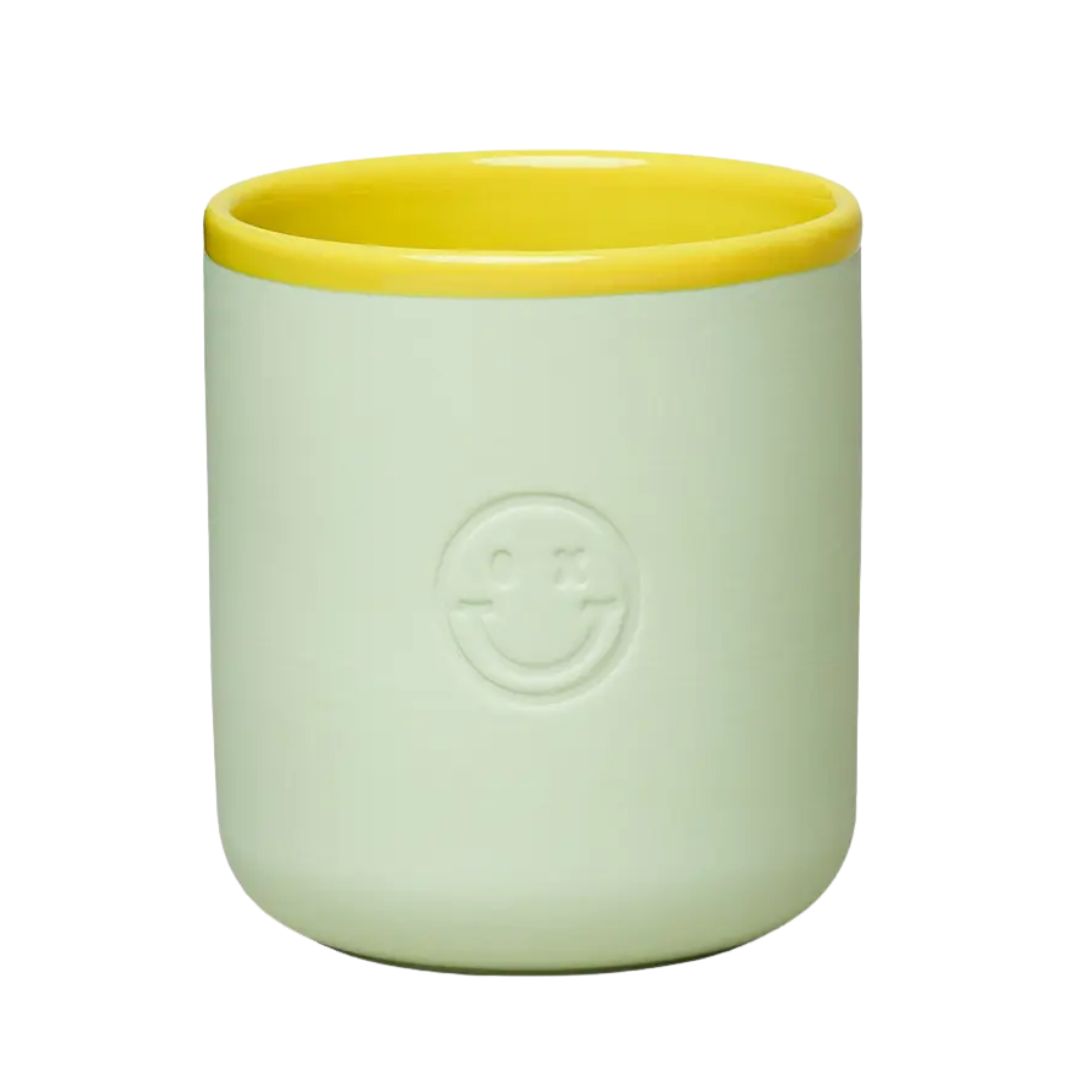 Good Mood Porzellanbecher mit Smiley 'Cheeky' mint/gelb