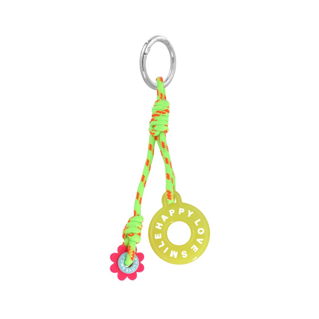 Schlüsselanhänger mit Blumen und kreisförmigen Motiven neongrün