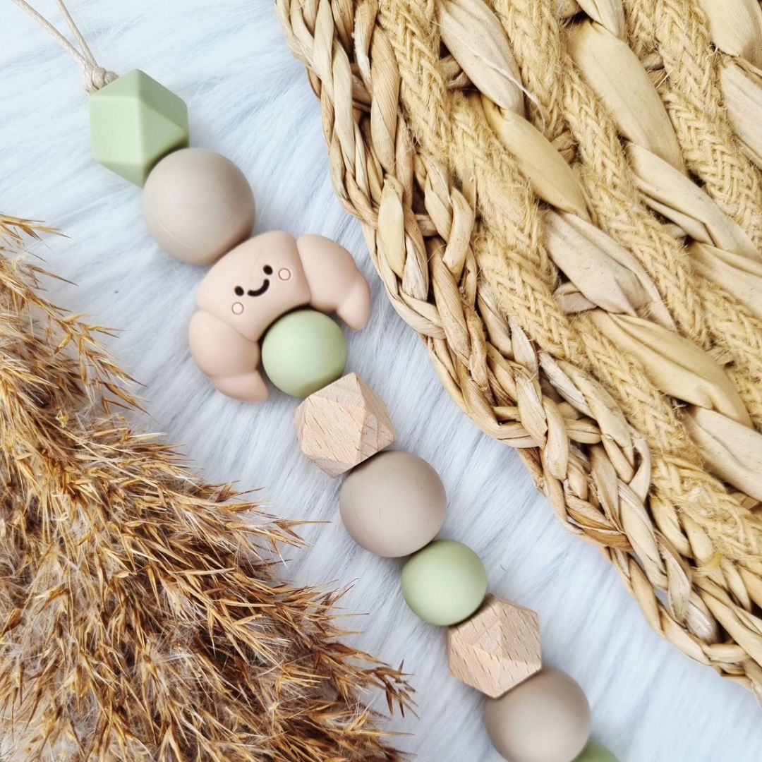 Schnullerkette Croissant salbei