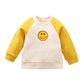 Kinder Sweatshirt mit Raglanärmeln und Smiley Applikation