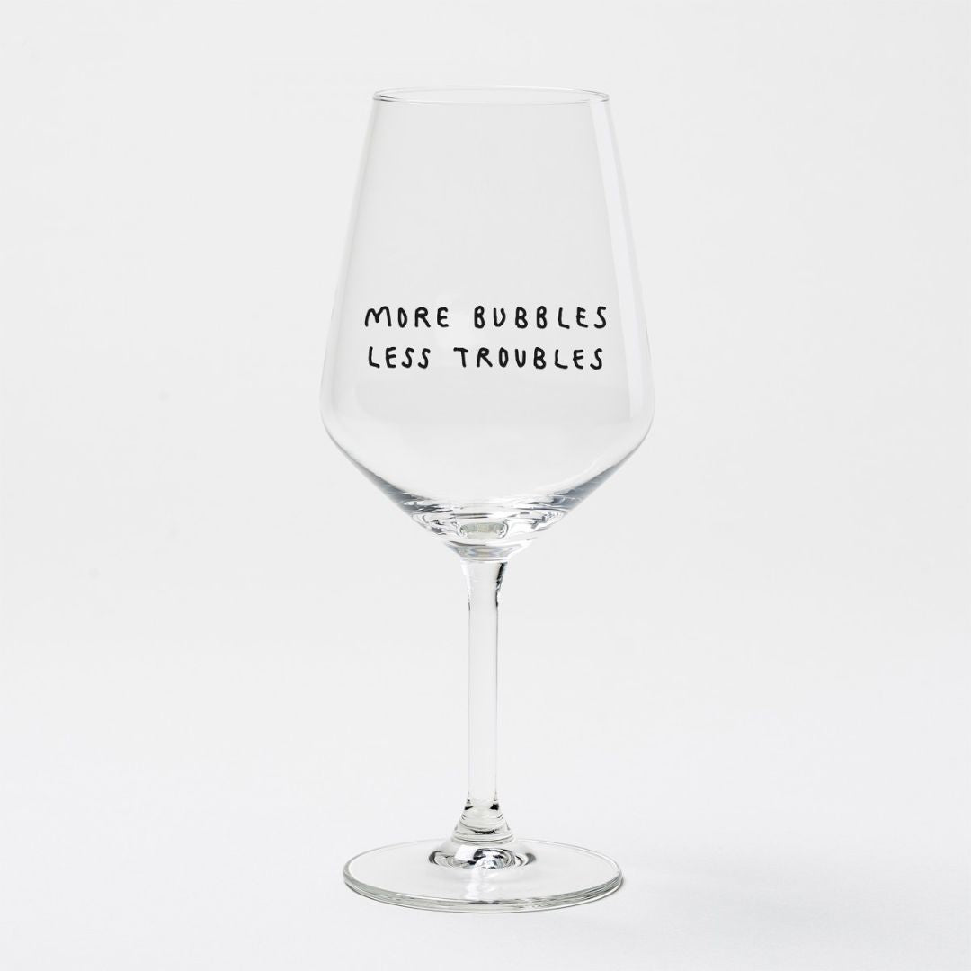 Weinglas 'More Bubbles Less Troubles'