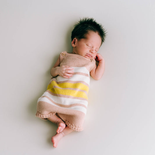 Baby Strampler mit gelb/rosa Streifen